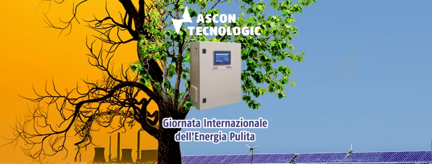 albero metà secco metà verde, industrie che inquinano, pannelli solari, pale eoliche Giornata Internazionale dell'Energia Pulita